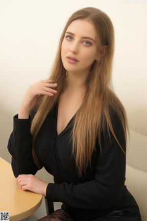 A young woman in a school uniform posing for a picture.