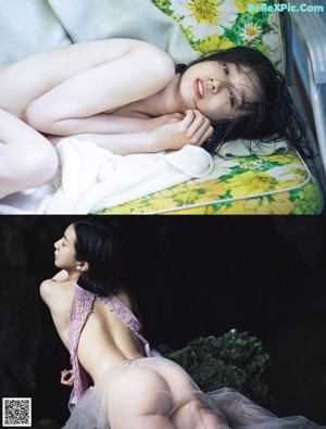 A woman in a black lingerie sitting on a green mat.